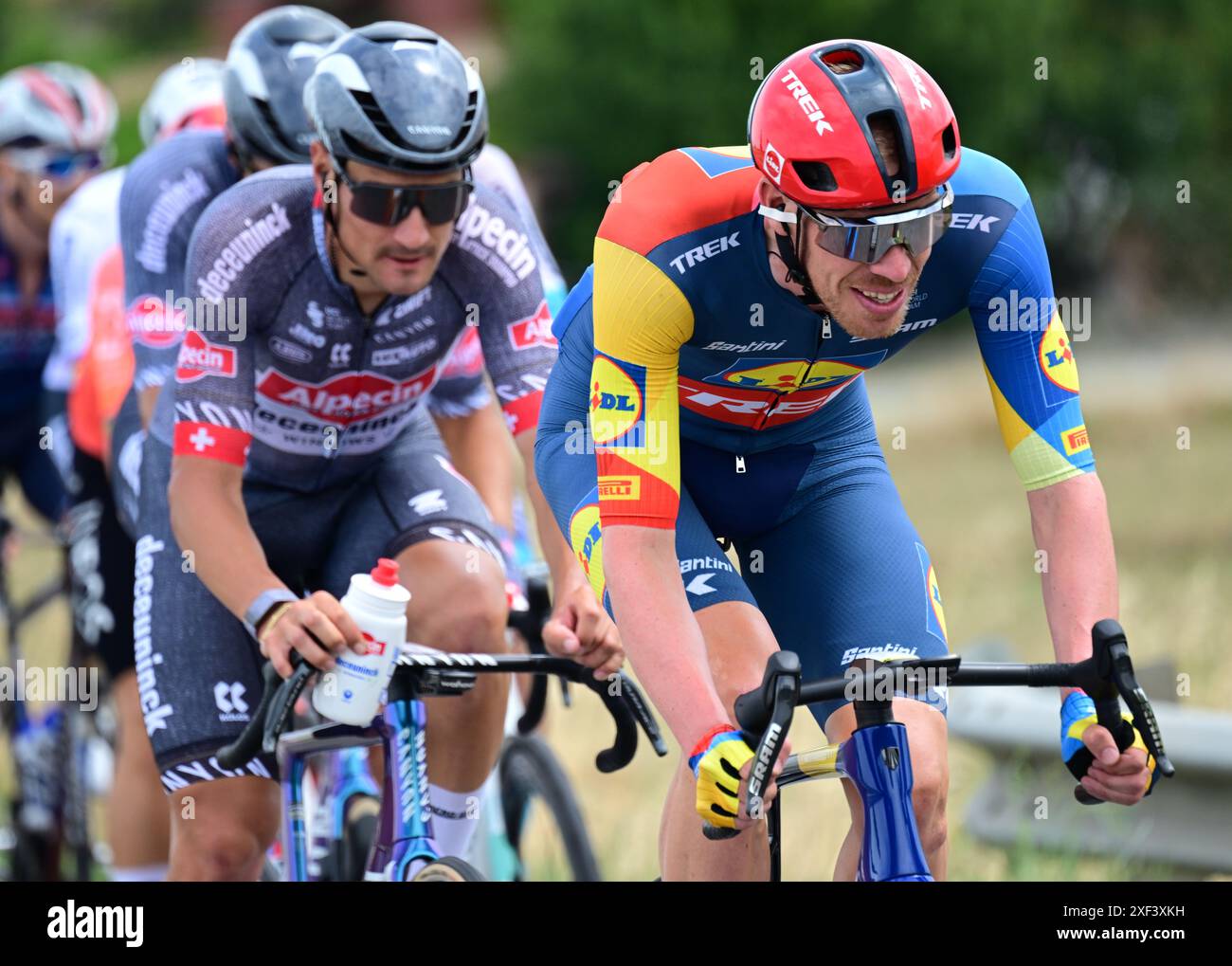 Turin, Italy. 01st July, 2024. Belgian Tim Declercq of Lidl-Trek (R ...