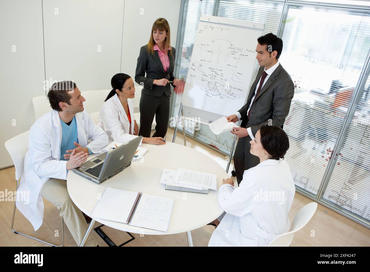 Meeting in office viewed hi-res stock photography and images - Alamy