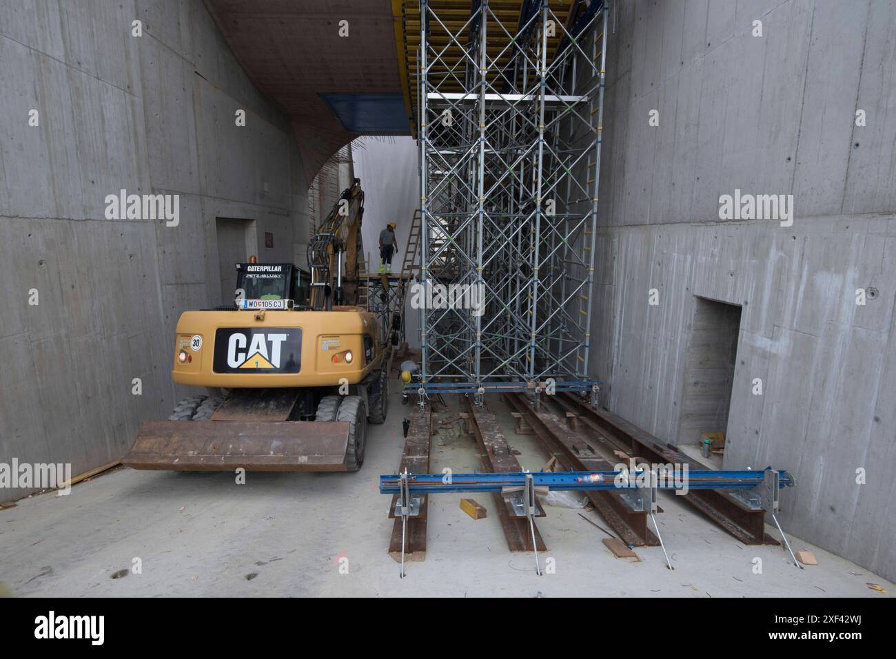 an excavator from the Caterpillar brand in the construction works ...