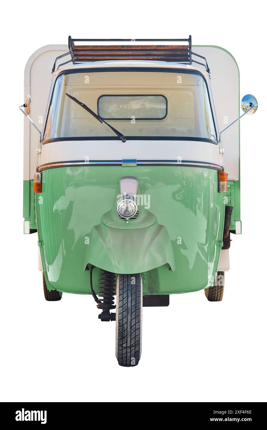 Front view of a vintage Italian three wheeled scooter van isolated on a white background Stock Photo