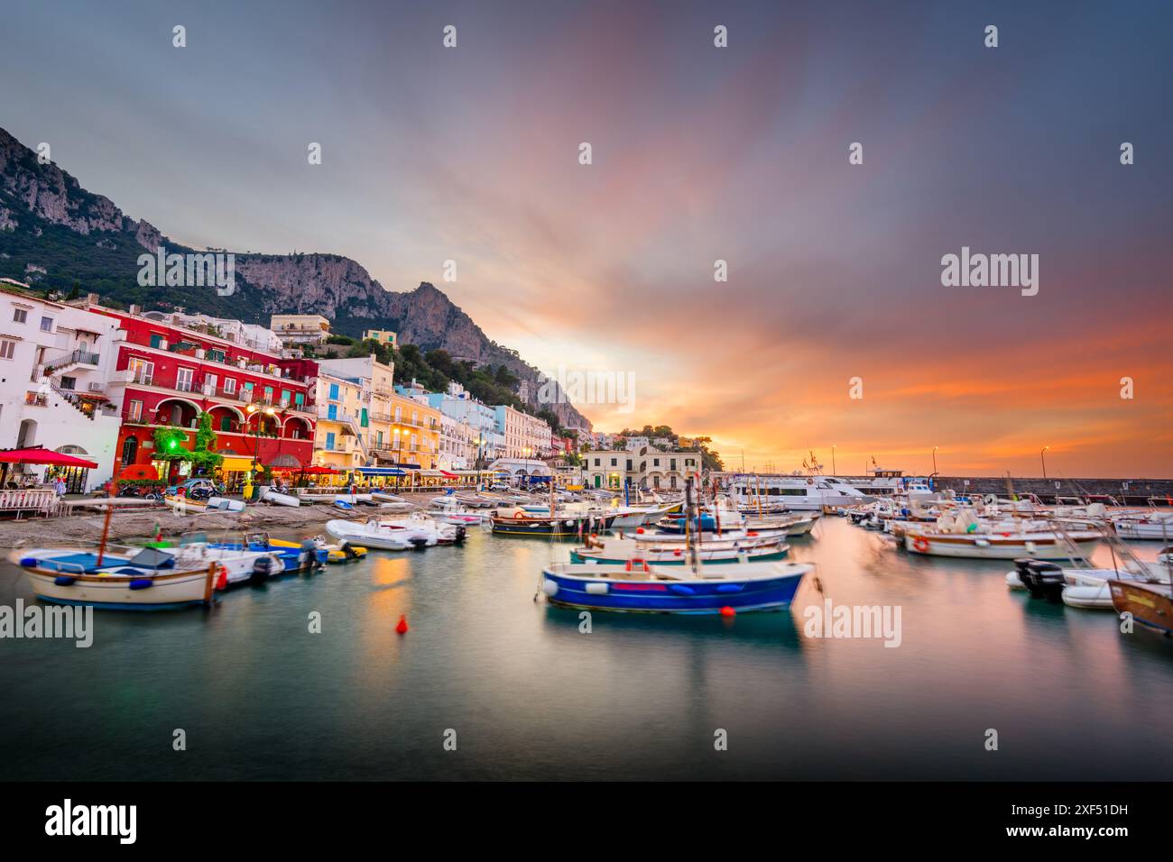 Capri, Italy with shops and restaurants at at Marina Grande at twilight. Stock Photo