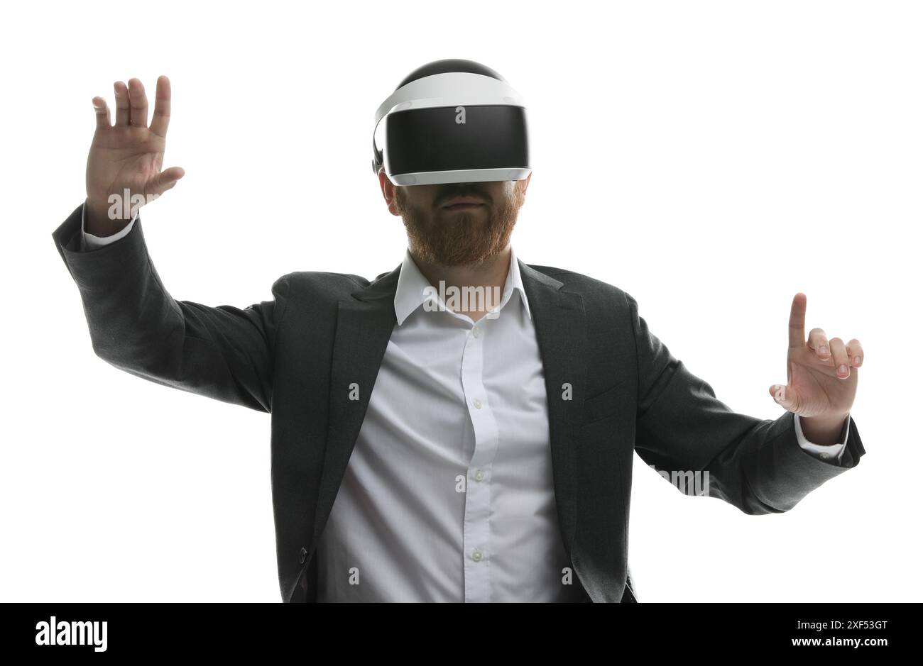 Man using virtual reality headset while sitting in office chair on ...