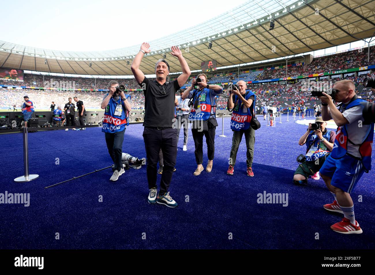 Switzerland manager Murat Yakin celebrates after winning the UEFA Euro