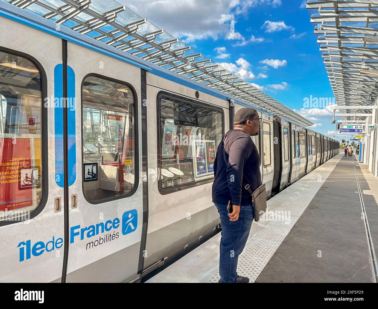 Rosny-sous-Boois, France, Paris Suburb, Man on Platform Subway, Metro LIne 11, Seine Saint Denis Public Transportation Stock Photo