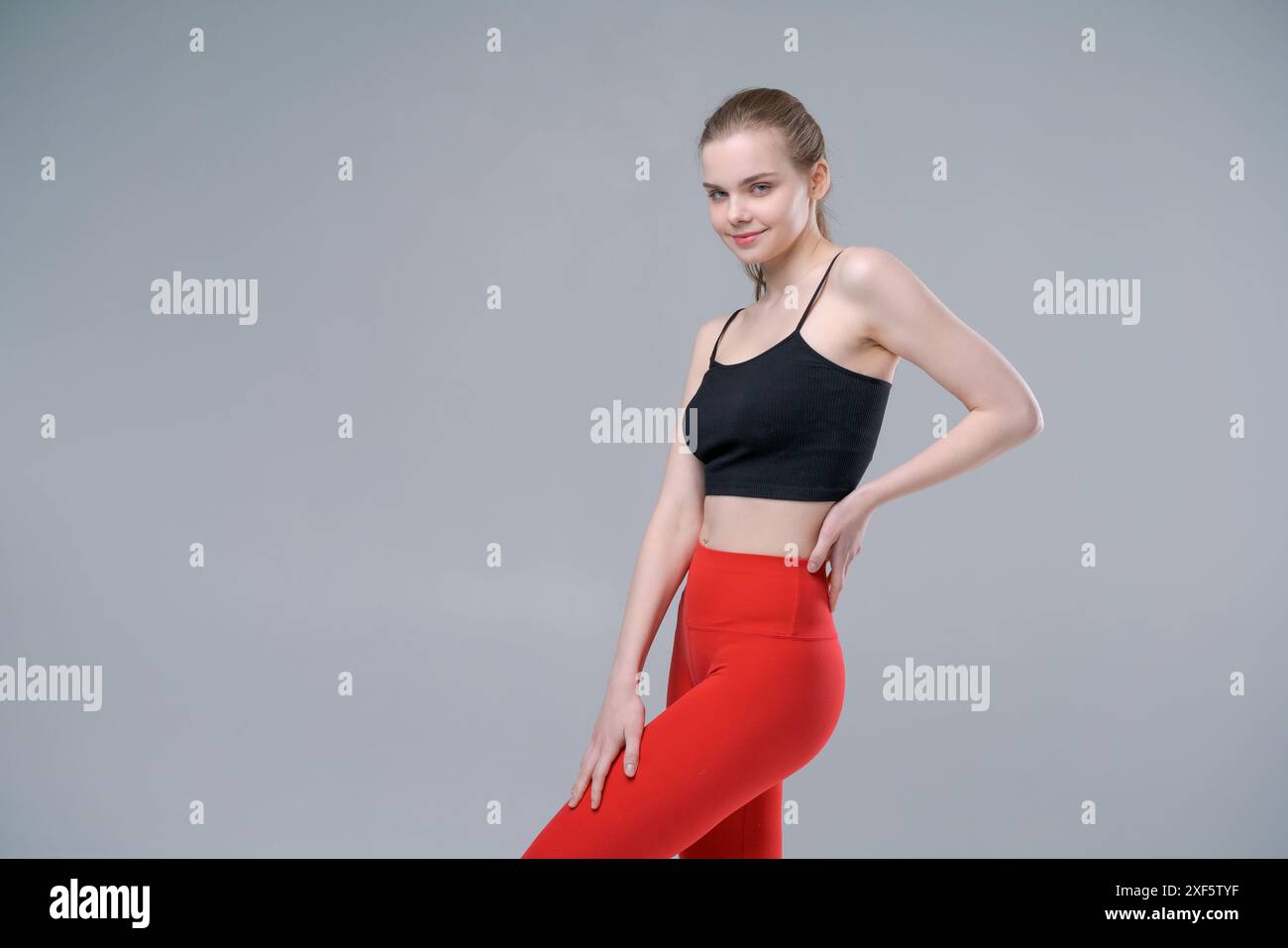 Woman wearing red tank top hi-res stock photography and images - Alamy
