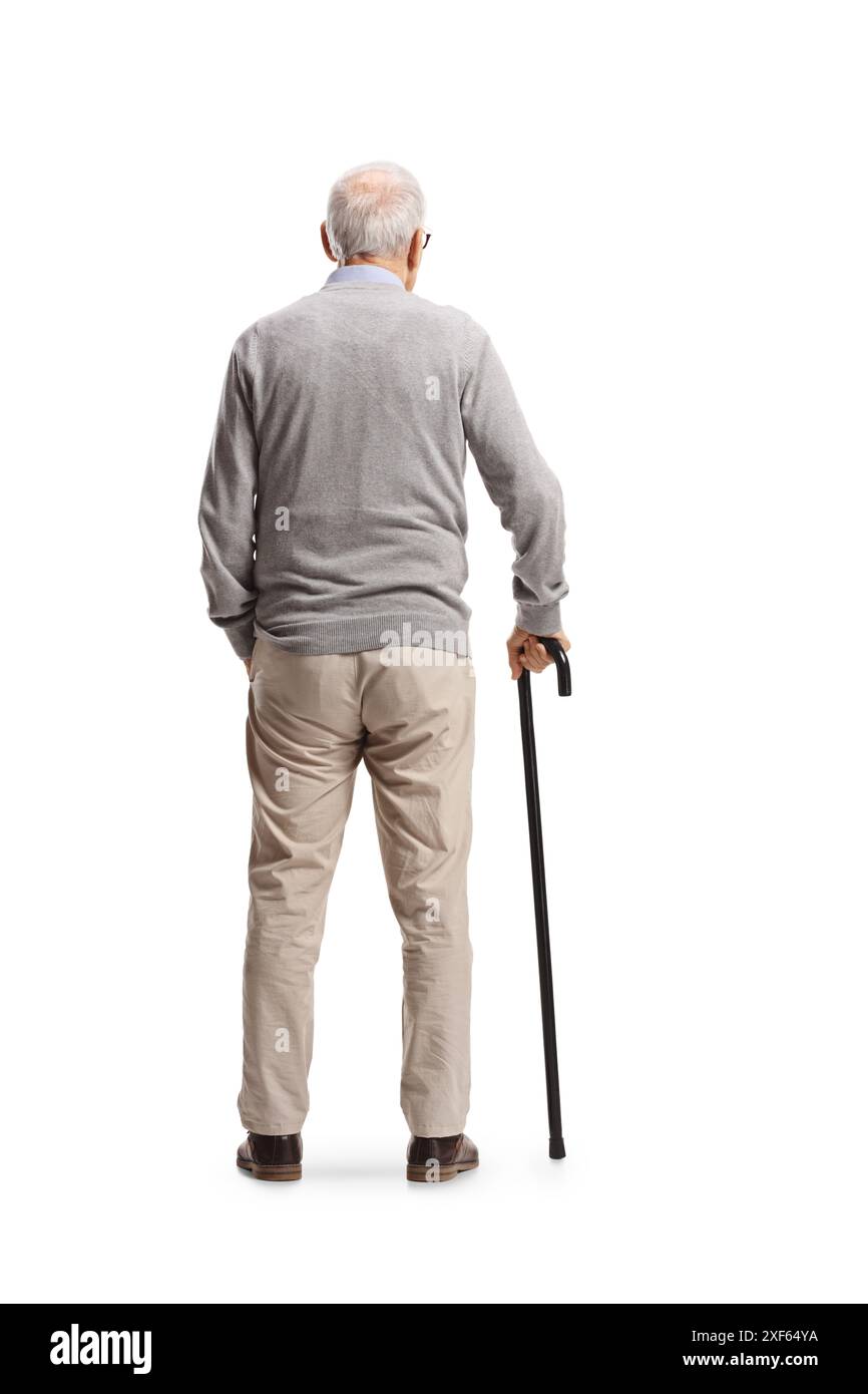 Rear view shot of an elderly man standing with a cane isolated on white ...