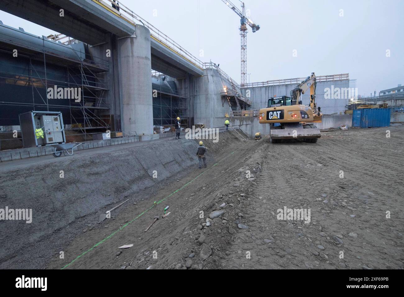 an excavator from the Caterpillar brand in the construction works ...