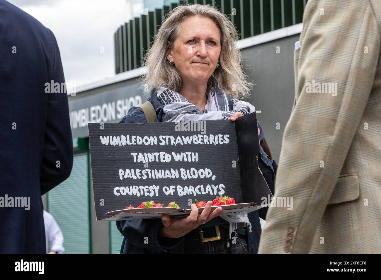London, UK. 1st July, 2024. A pro-Palestinian activist holds a prop ...