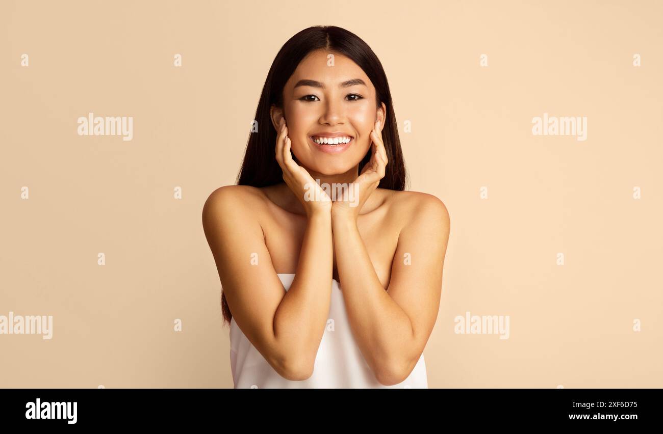 Smiling asian woman posing isolated hi-res stock photography and images ...