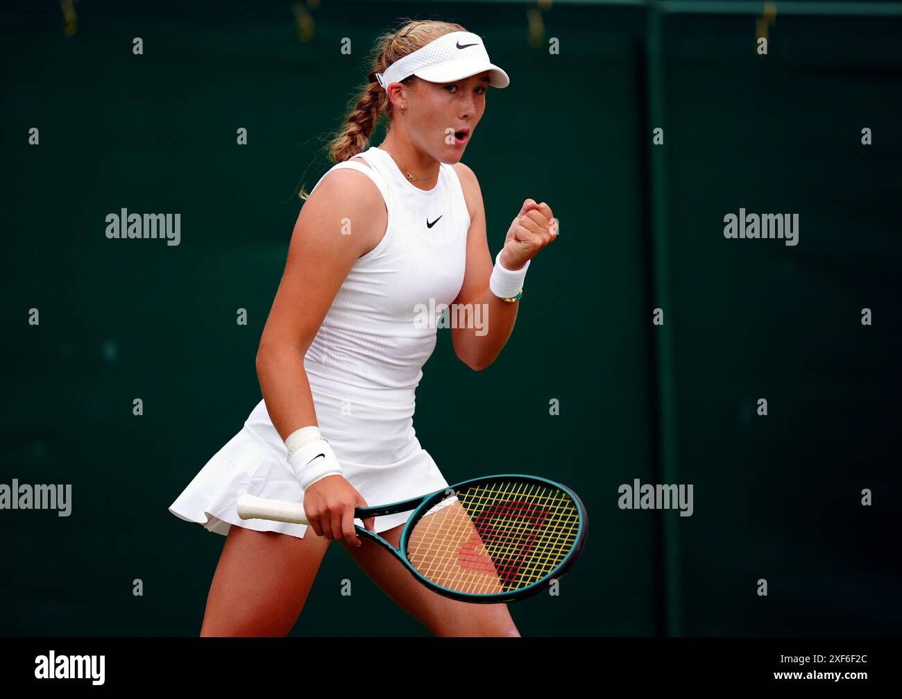 Mirra Andreeva during her match against Brenda Fruhvirtova (not pictured) on day one of the 2024 Wimbledon Championships at the All England Lawn Tennis and Croquet Club, London. Picture date: Monday July 1, 2024. Stock Photo