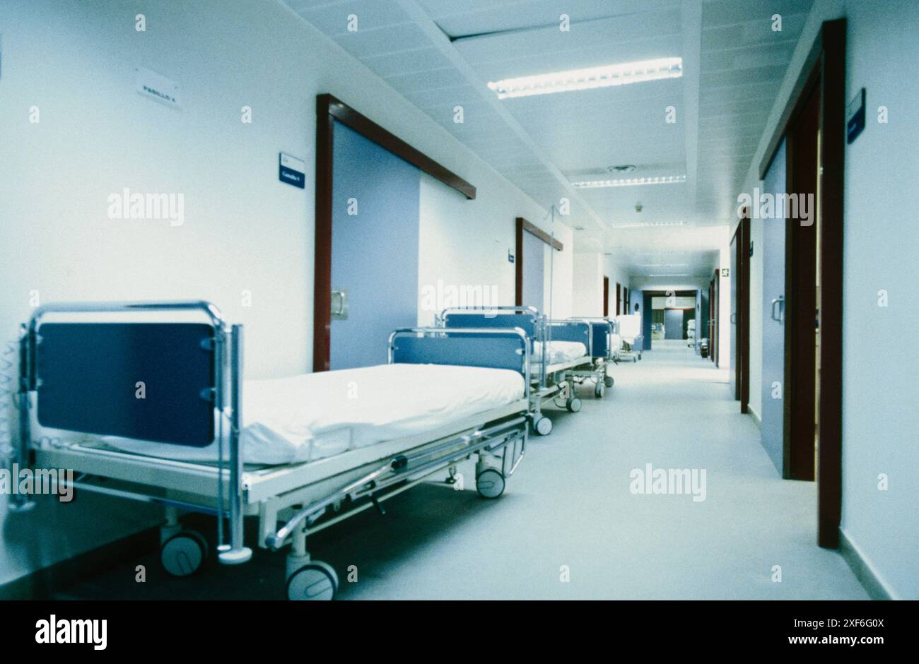 Beds in hospital corridors hi-res stock photography and images - Alamy