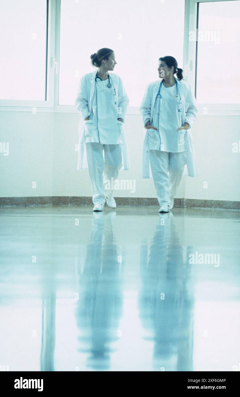 Two nurses stand in hospital hi-res stock photography and images - Alamy