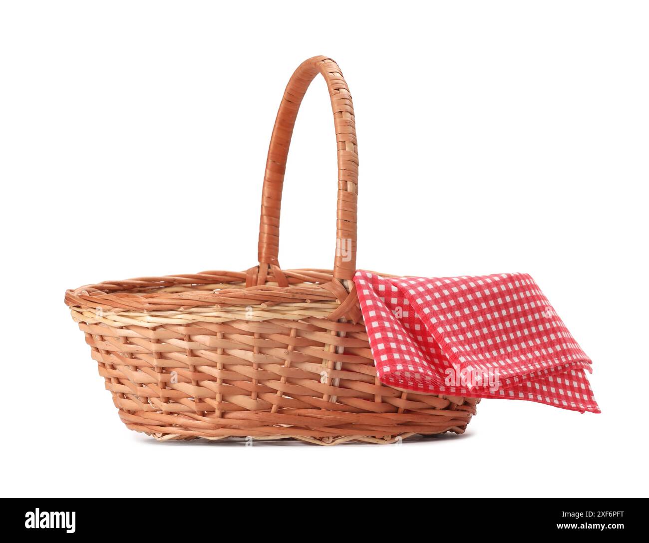 One picnic wicker basket with checkered napkin isolated on white Stock ...