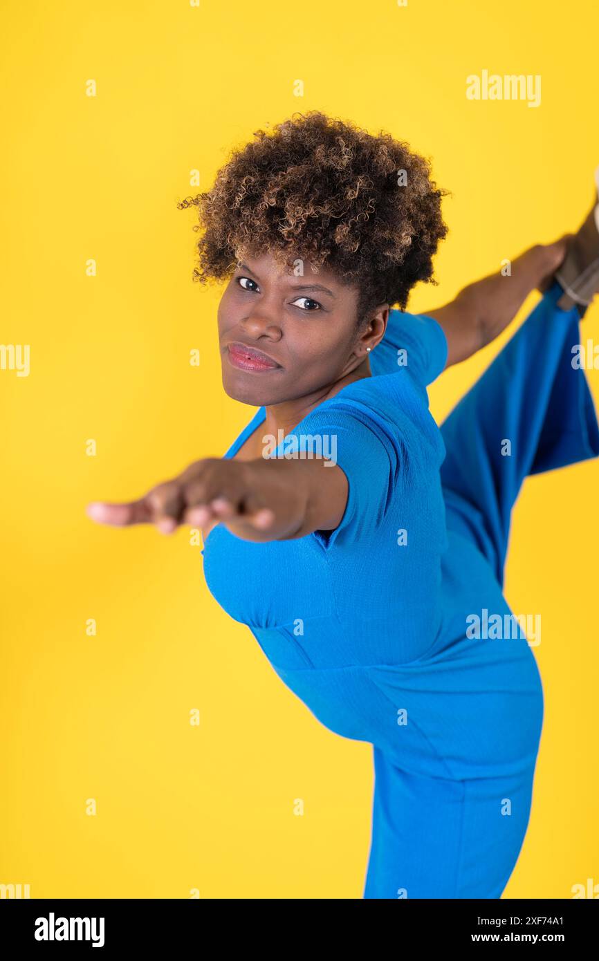 Woman in blue jumpsuit hi-res stock photography and images - Alamy