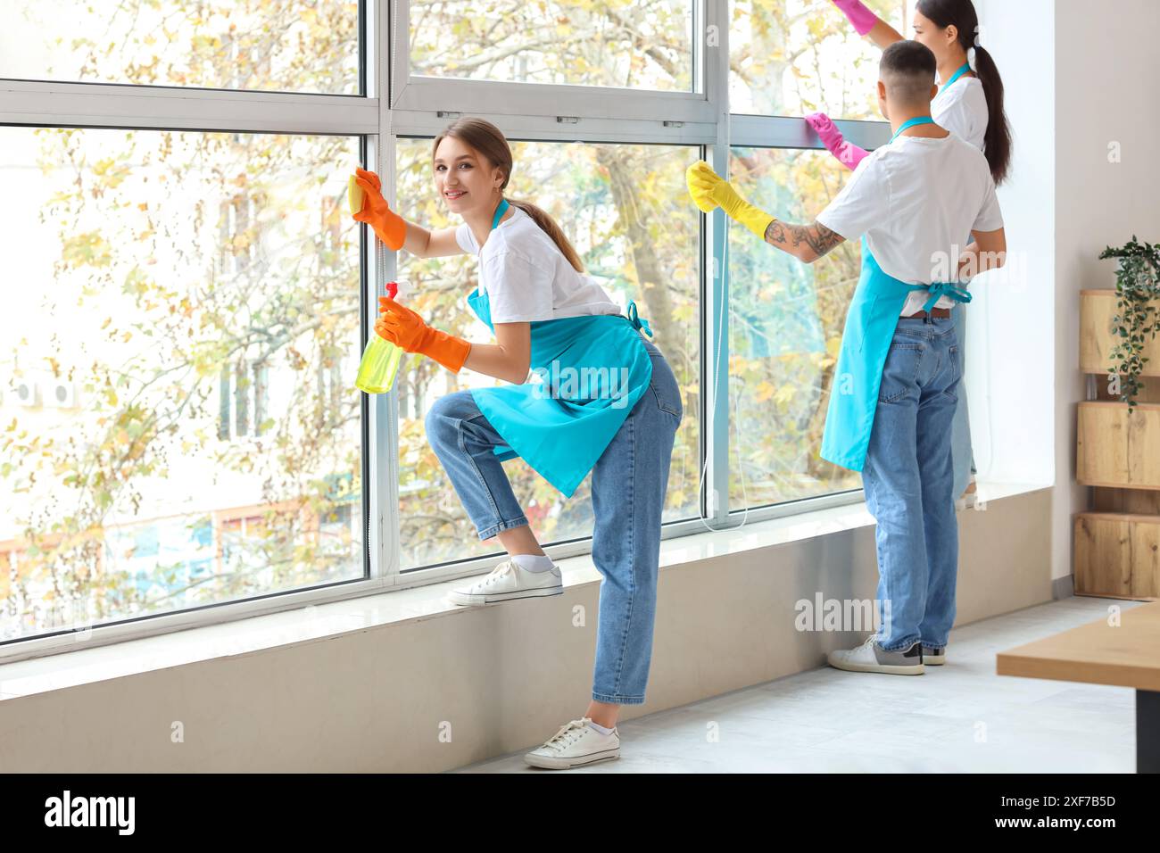 Portrait happy janitors cleaning hi-res stock photography and images ...