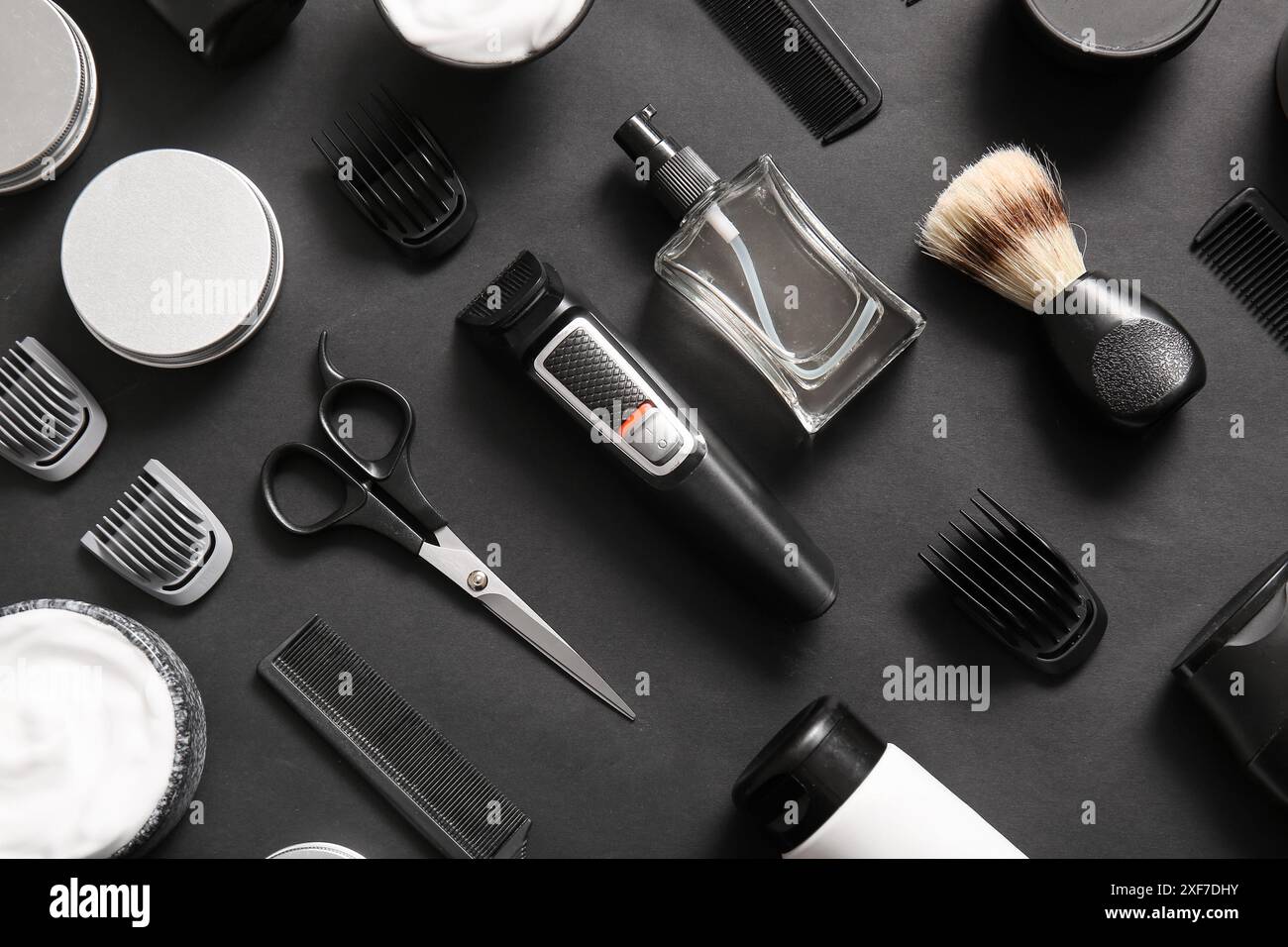 Modern trimmer and shaving accessories on black background Stock Photo