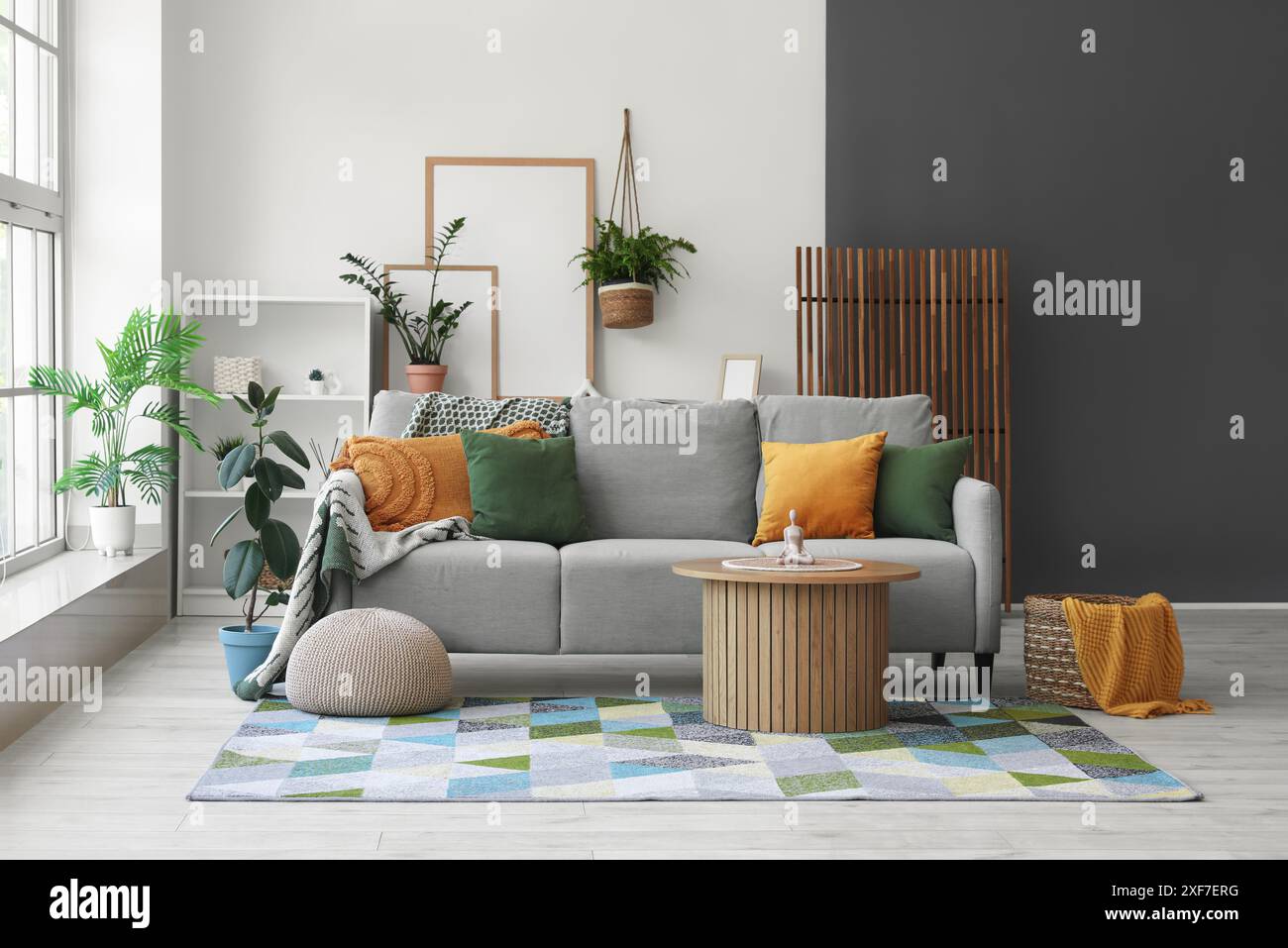 Interior of modern room with comfortable sofa and coffee table Stock ...