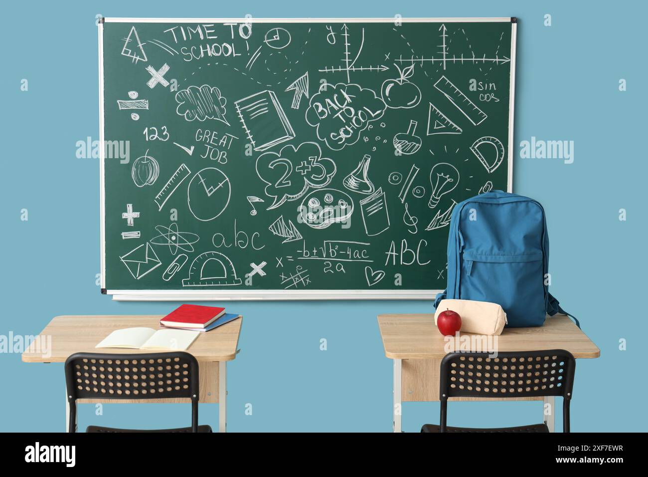 Interior of classroom with desks and chalkboard Stock Photo - Alamy