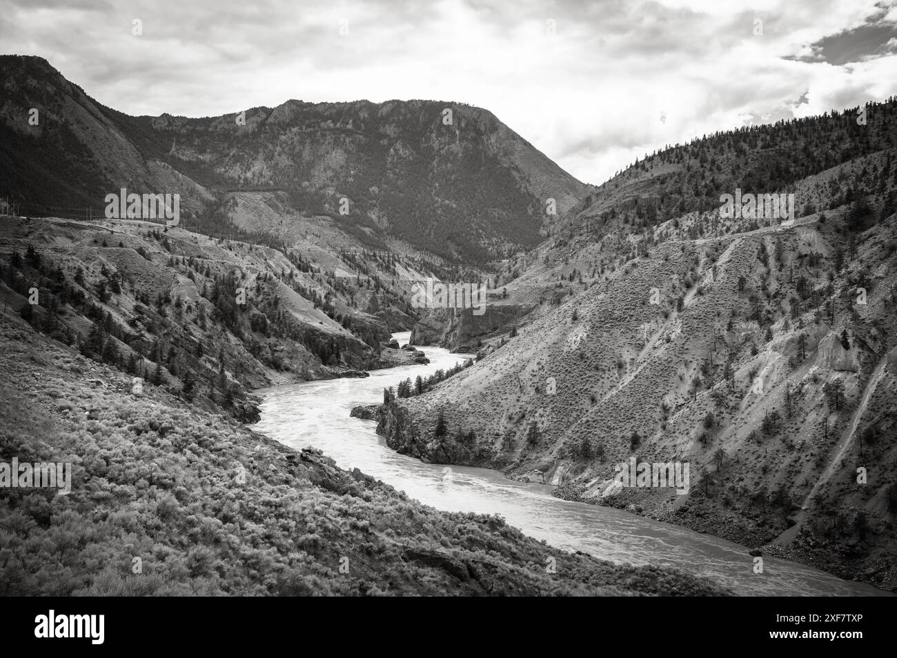 The Fraser River near Lillooet BC, Canada along highway 99.  Black and white image. Stock Photo