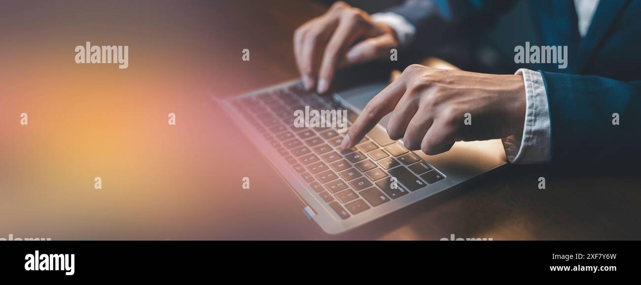 businessman using laptop in office. technology and connectivity drive business success. bokeh background featuring. It's an excellent choice to create Stock Photo