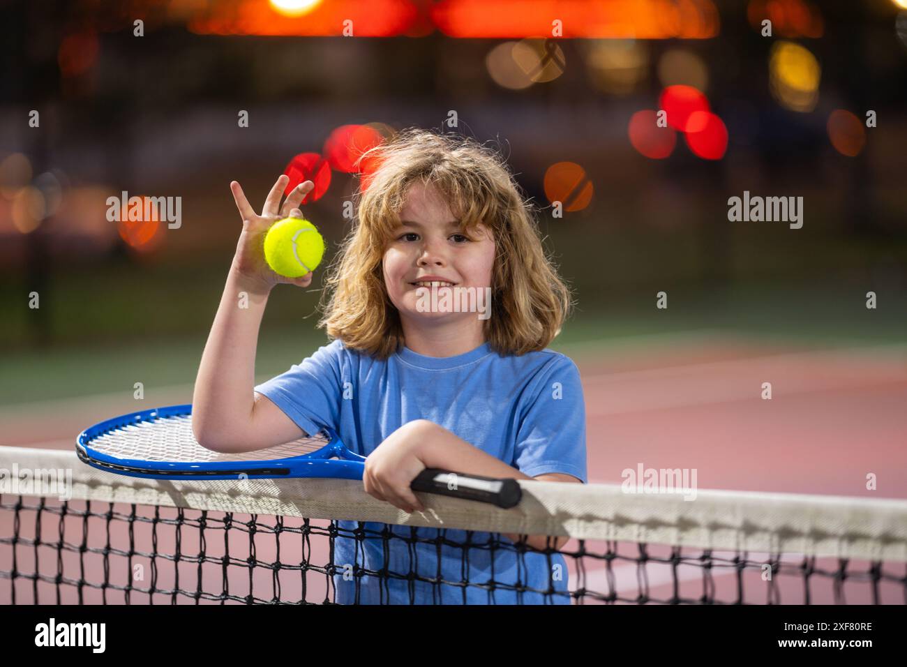 Kid Throwing A Racket Child hit tennis ball racket hi-res stock photography and images - Alamy