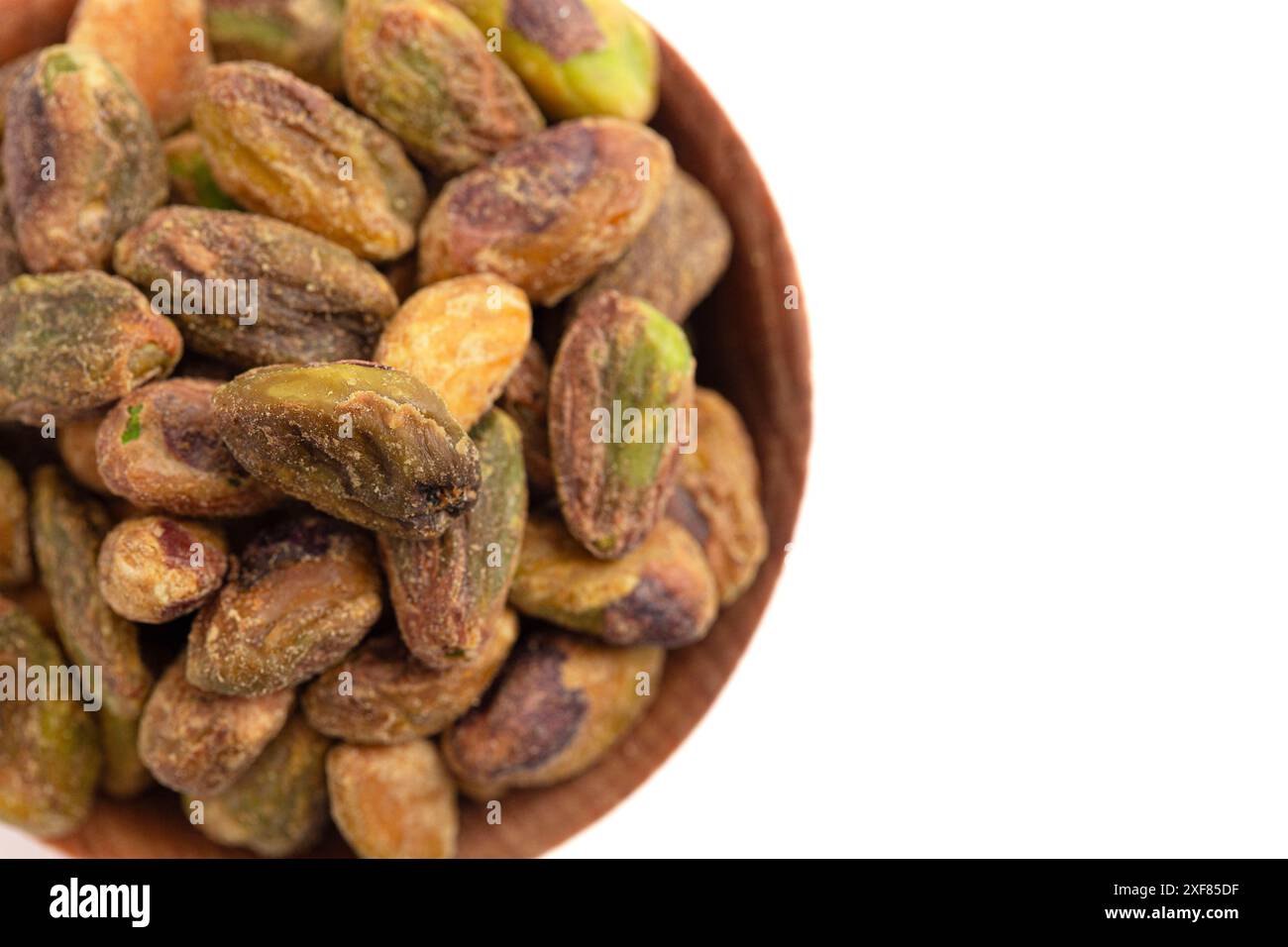 Pistachios without Shells Isolated on a White Background Stock Photo