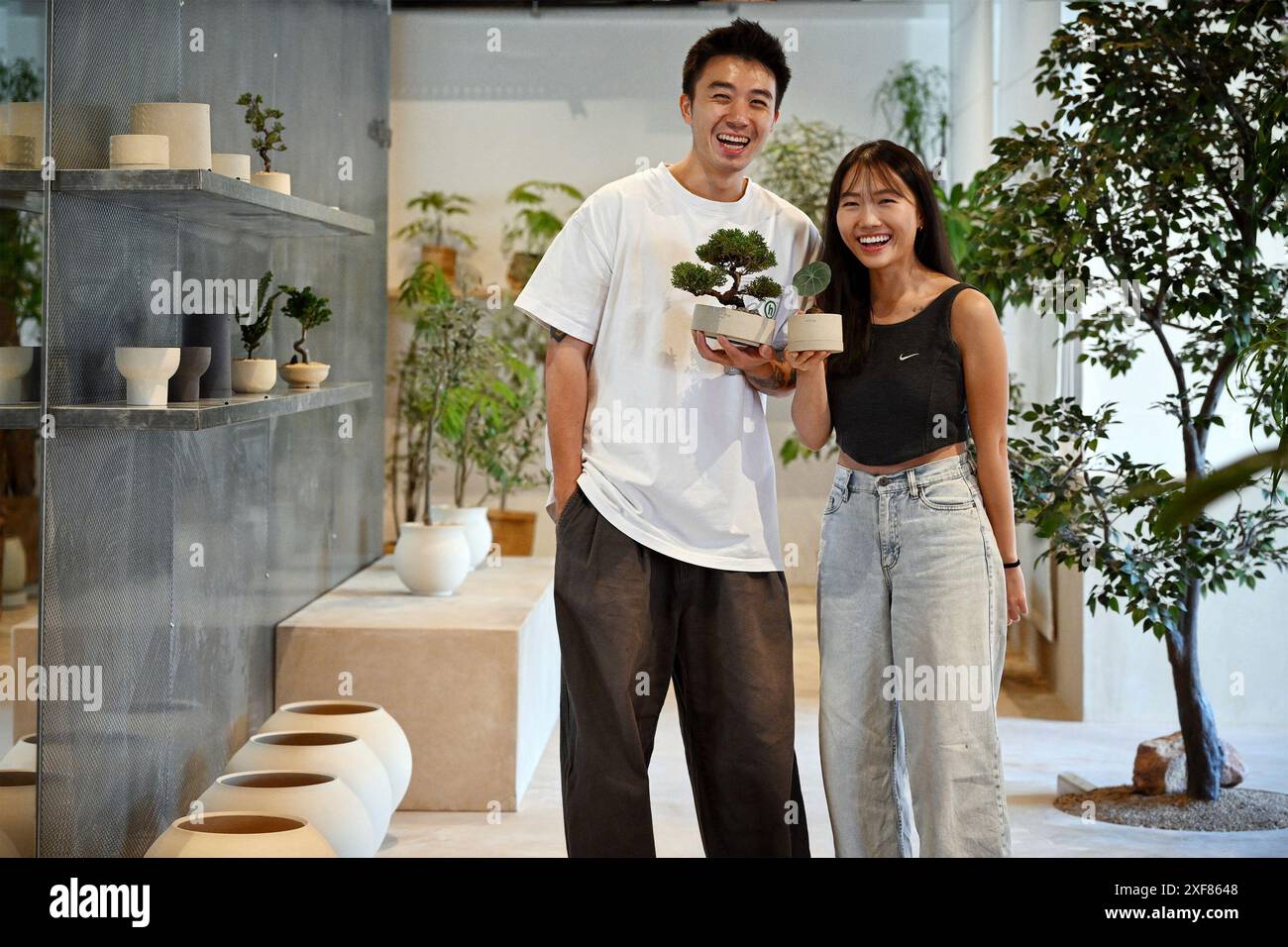 Angeline Pot Soilboy co- founders Ivan Woo and Angeline Goh at their store, 12 June ...