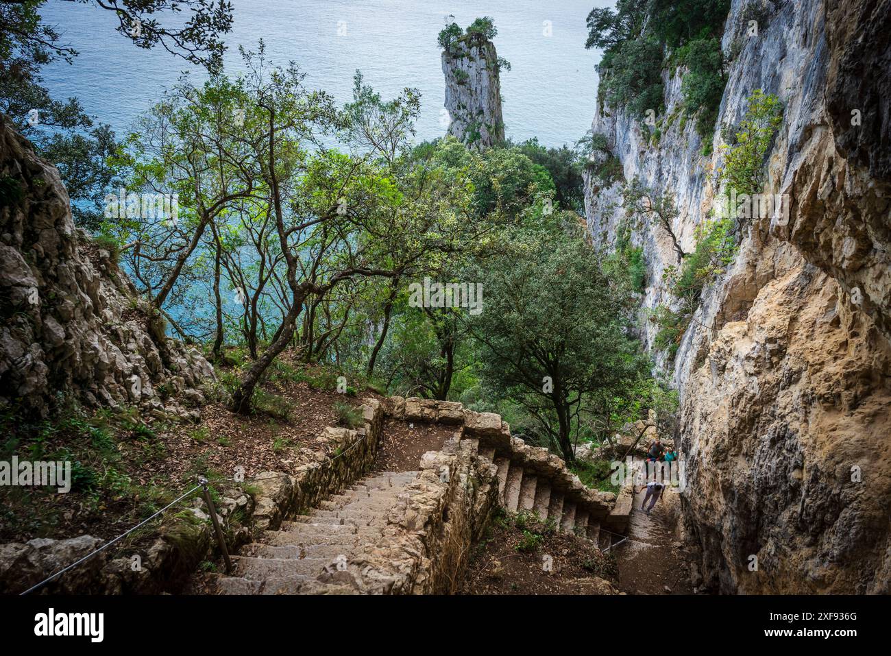 ascent of the stairs of Del Caballo lighthouse, Buciero mountain, Santoña, Cantabria, Spain Stock Photo