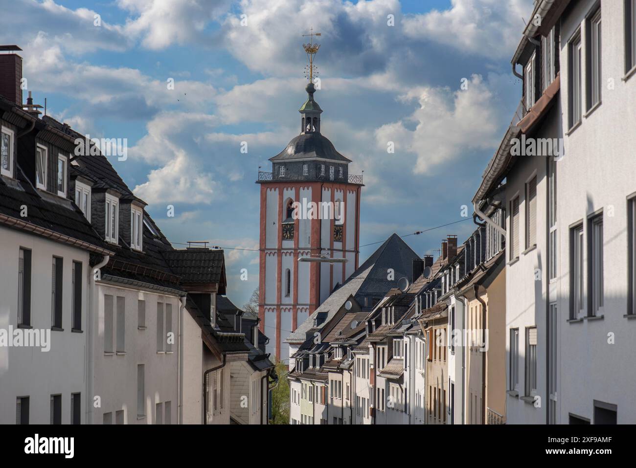 Old town houses with the tower of the historic Nikolaikirche church ...