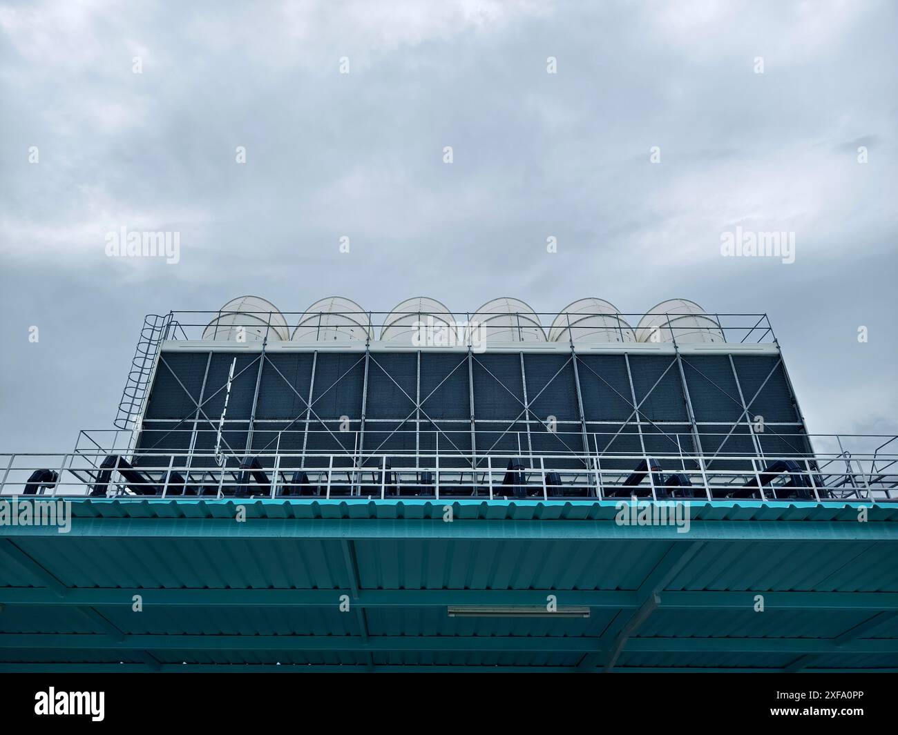View of Ventilation pipes on the top of large industrial building Stock Photo ...