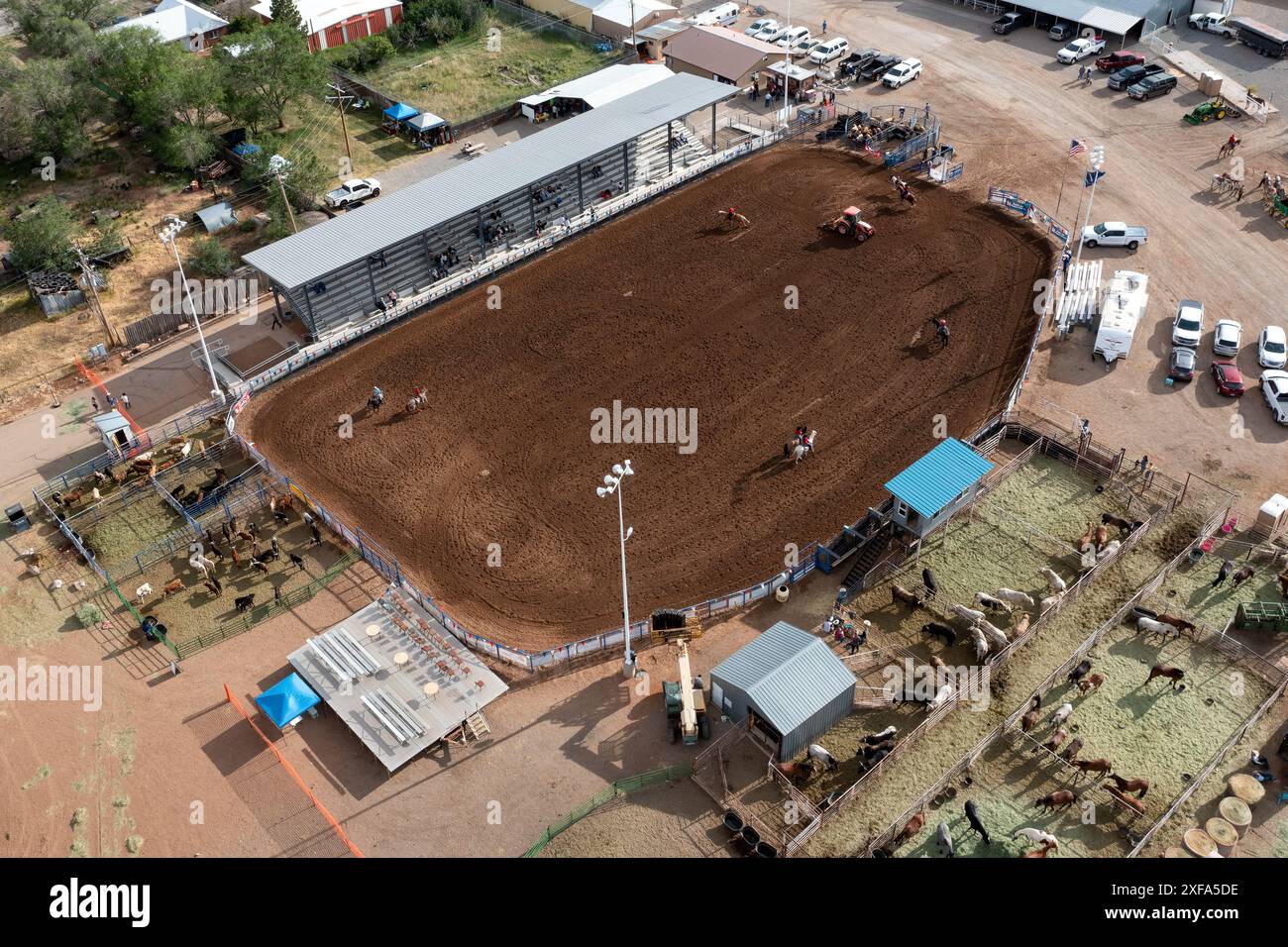 Aerial view of the San Juan County Rodeo Arena in Monticello, Utah.  Workers are preparing the arena for the rodeo. Stock Photo