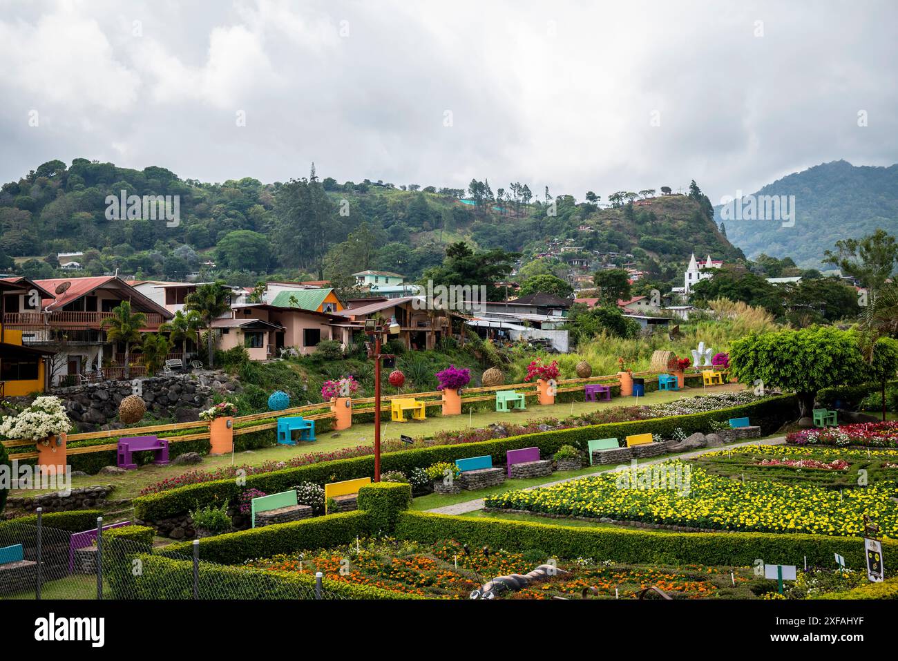 View of a colourful garden and landscape beyond with Baru volcano, , Boquete, a small mountain town in the Province of Chiriquí, Panama Stock Photo