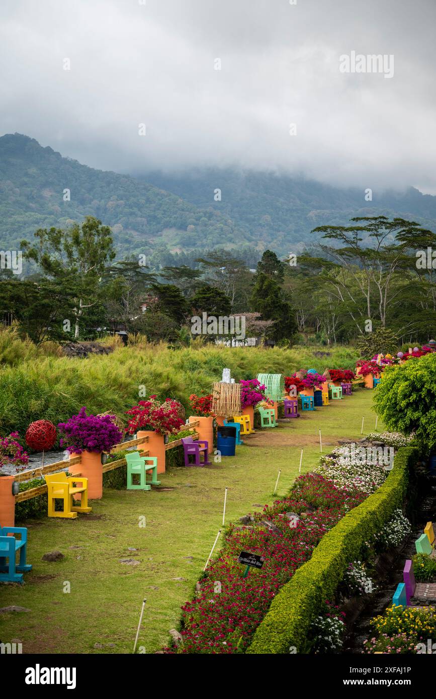 View of a colourful garden and landscape beyond with Baru volcano, , Boquete, a small mountain town in the Province of Chiriquí, Panama Stock Photo