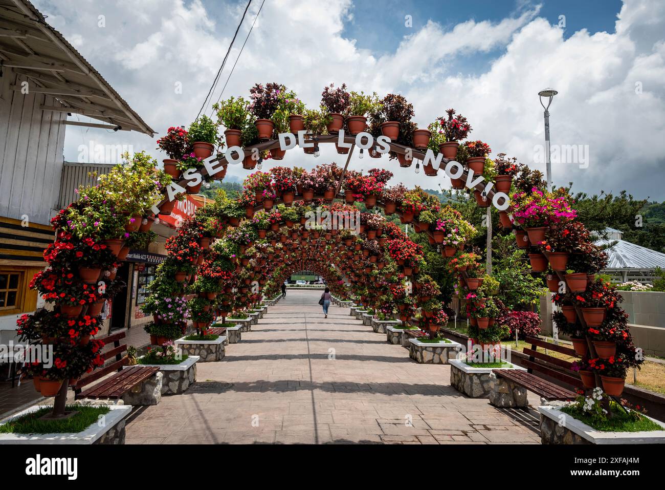 Arch made out of potted flowers and titles 'The passage of couples', Boquete, a small mountain town in the Province of Chiriquí, Panama Stock Photo