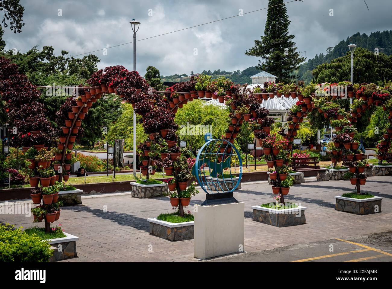 Arch made out of potted flowers and titles 'The passage of couples', Boquete, a small mountain town in the Province of Chiriquí, Panama Stock Photo