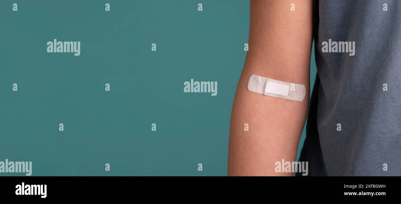 Blood cells, donate plasma, world blood donor day, health care, transfusion, Leukaemia disease, arm with plaster Stock Photo