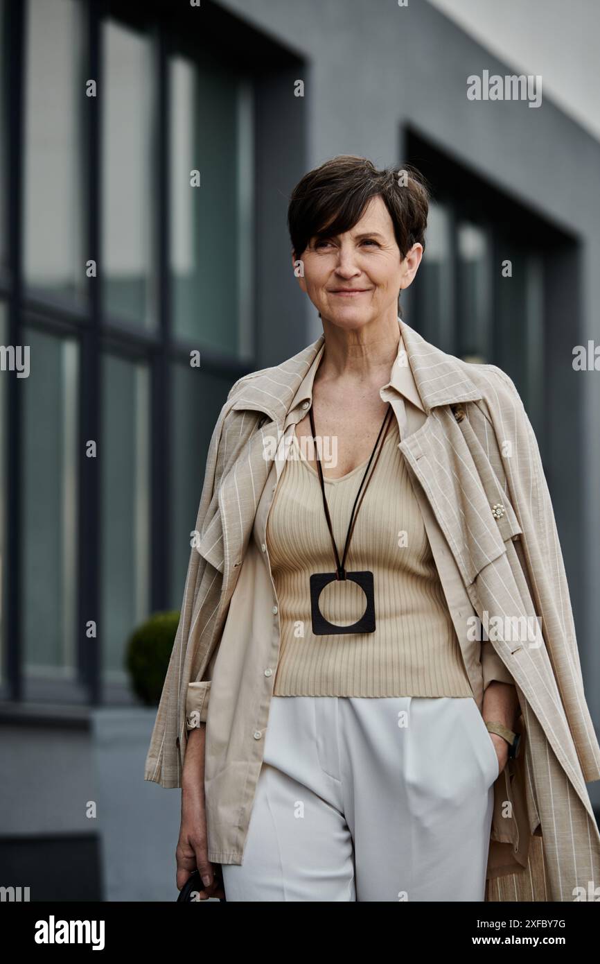 Woman walks confidently down hi-res stock photography and images - Alamy