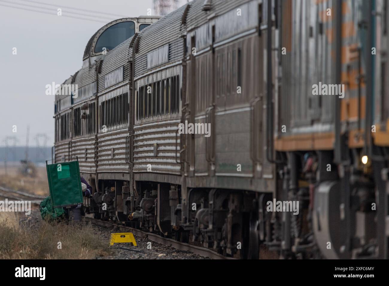 Five carriage long train that travels across the Canadian prairies and into the tundra of northern Manitoba. Stock Photo