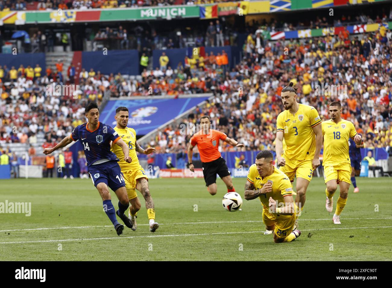 MUNICH - (l-r) Tijjani Reijnders of Holland, Marius Marin of Romania, Bogdan Racovitan of Romania, Radu Dragusin of Romania during the UEFA EURO 2024 round of 16 match between Romania and the Netherlands at the Munich Football Arena on July 2, 2024 in Munich, Germany. ANP MAURICE VAN STEEN Stock Photo