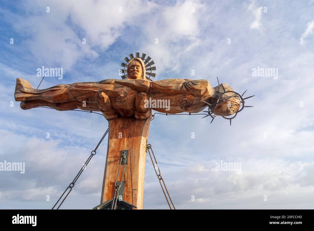 summit Schönfeldspitze in mountain range Steinernes Meer, summit cross showing Virgin Mary cradling the dead body of Jesus a wooden PietÃ  Steinernes Stock Photo