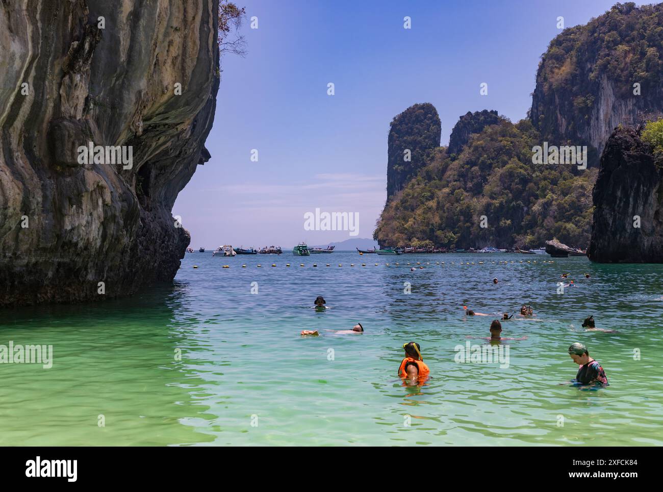 A picture of the Koh Hong Island Beach, with many people swimming. Stock Photo