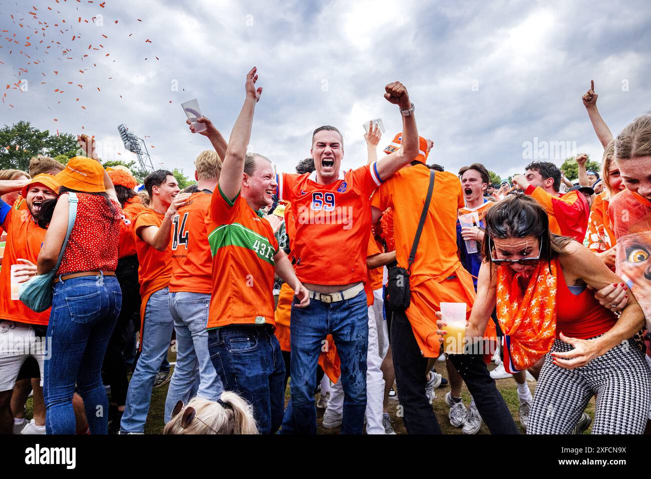 MUNICH - Dutch fans watch the eighth final match at the European ...