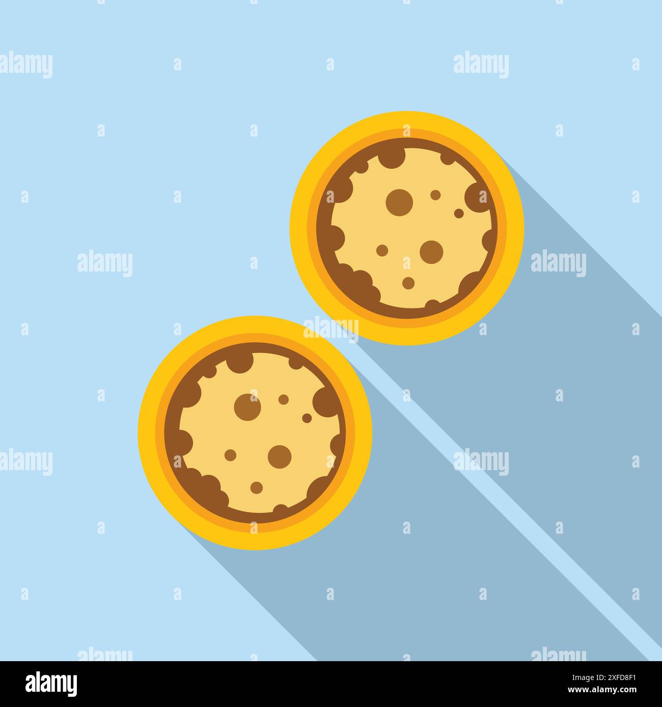 Two Round Cookies Two delicious round cookies with chocolate chips lying on a blue ...