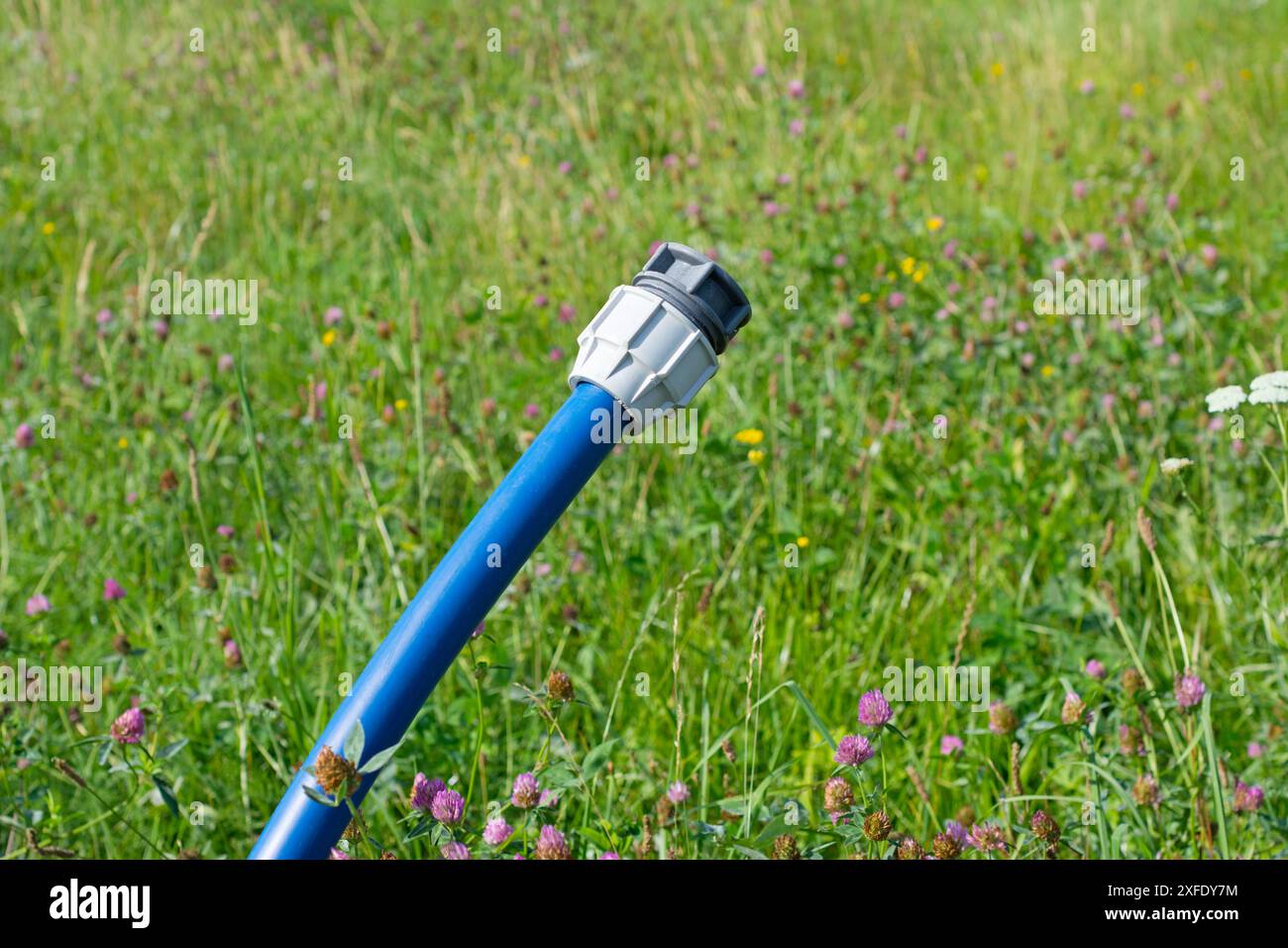 Domestic water connection from drinking water pipe on building land. Stock Photo