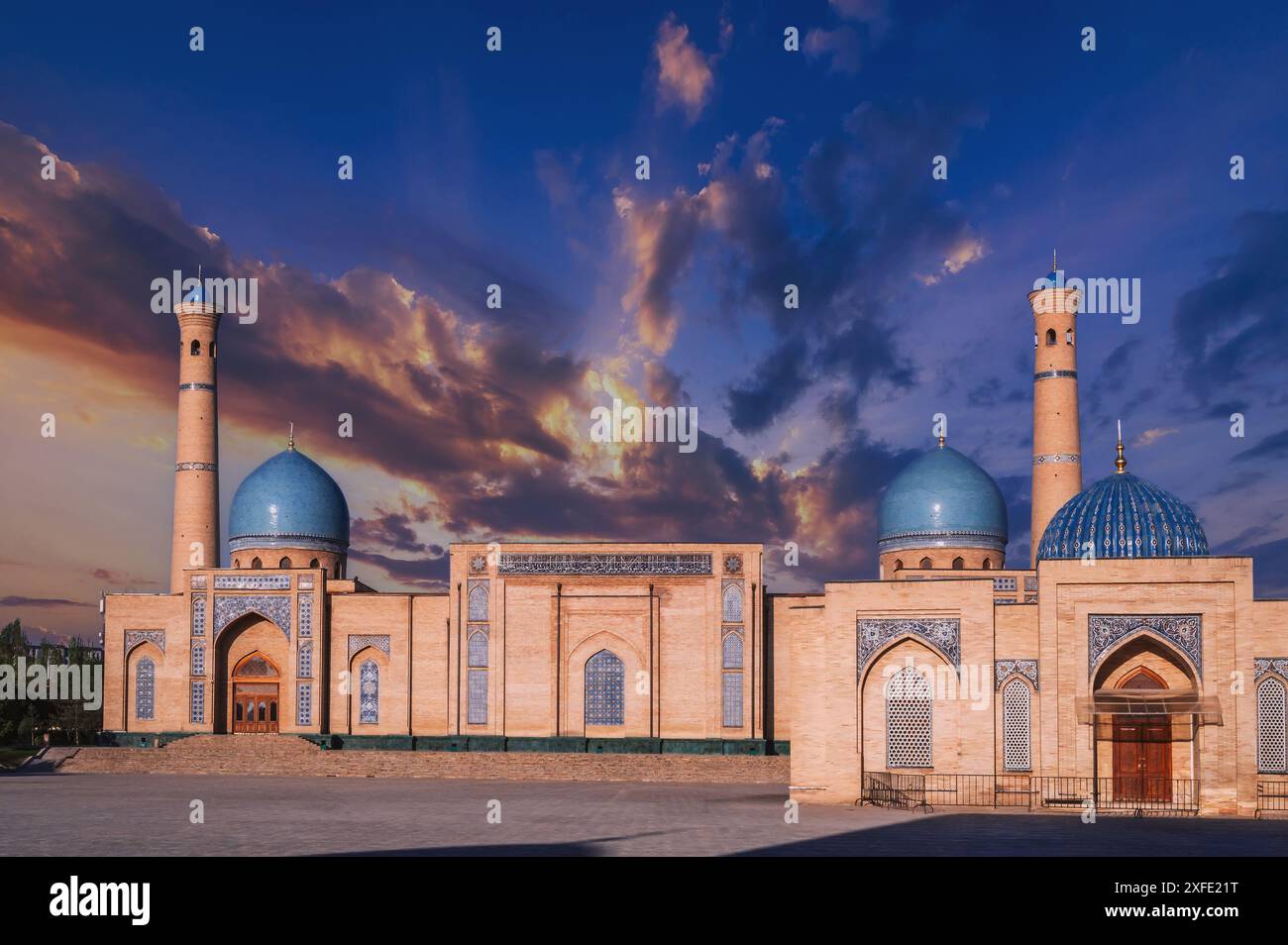 Khast Imam is architectural complex in Tashkent in Uzbekistan. Hazrati Imam Mosque and Muyi Muborak Madrasah Library Museum on the square in summer Stock Photo