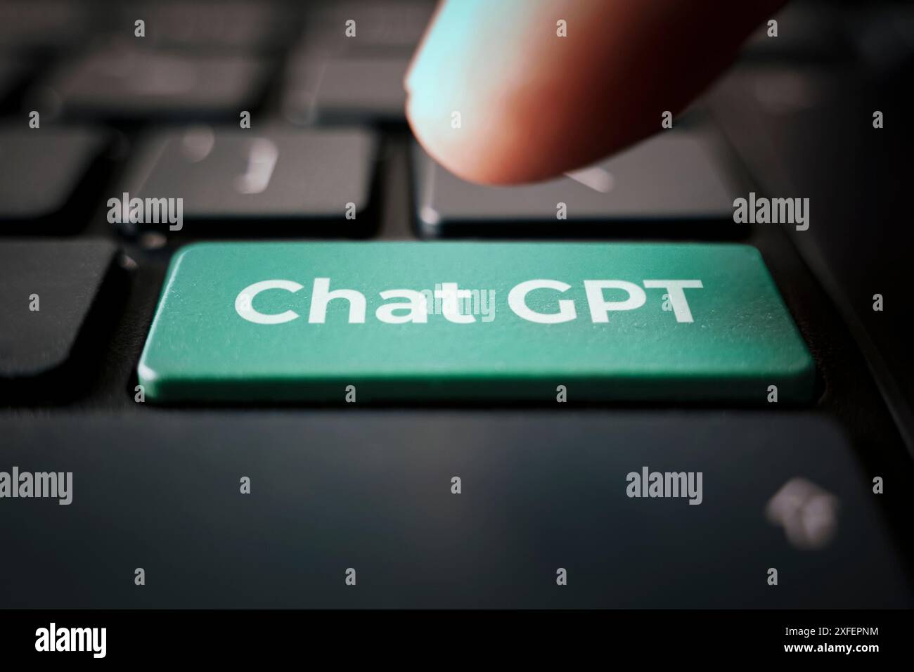 ChatGPT on the keyboard button for Chat with AI or Artificial Intelligence. smart AI or artificial intelligence using an artificial intelligence chatb Stock Photo