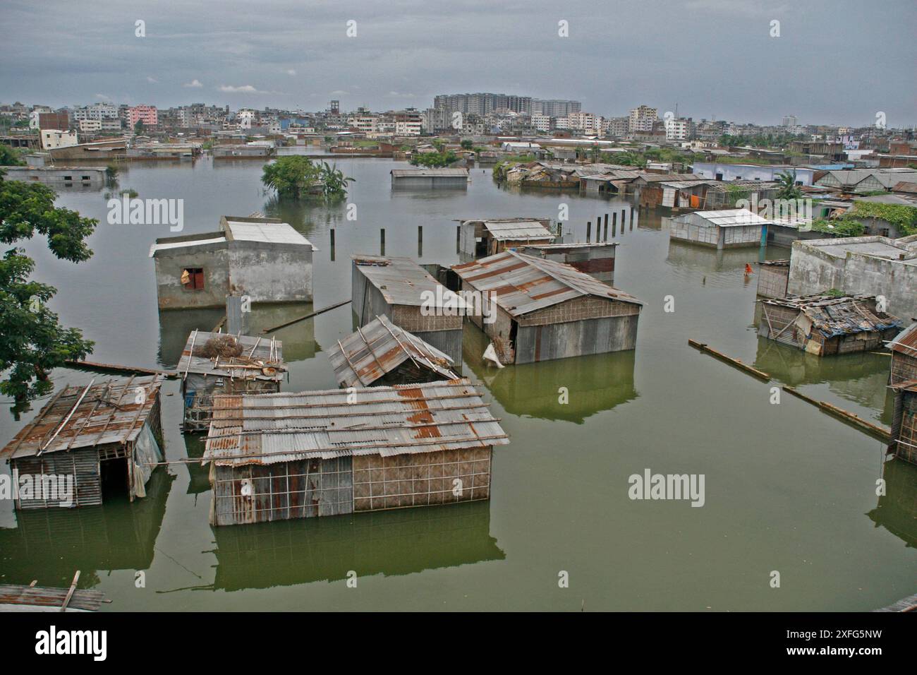 An aerial view shows the submerged houses of low-lying area at Adabar ...
