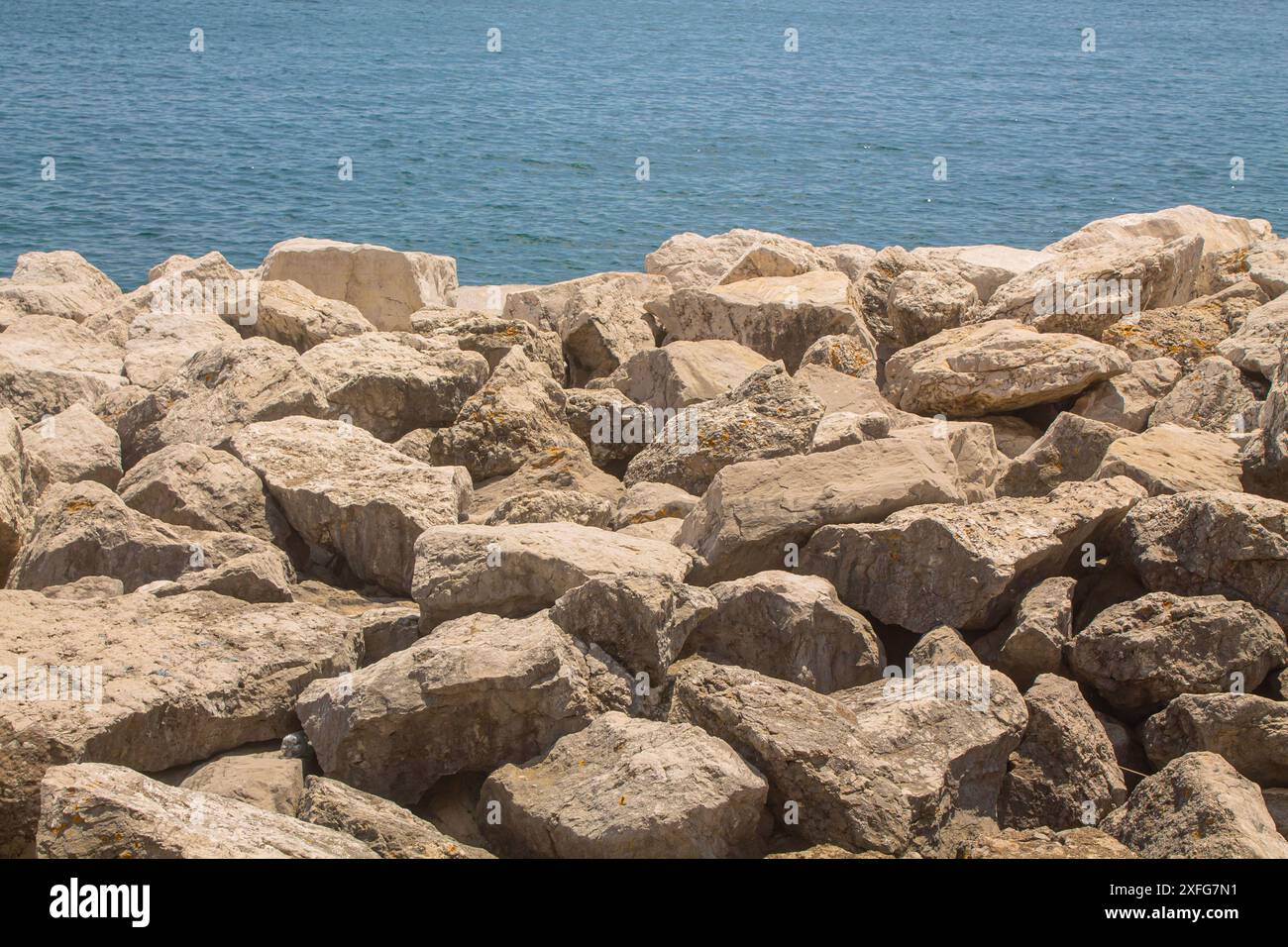 rocks in the sea on the beach, seashore Stock Photo - Alamy