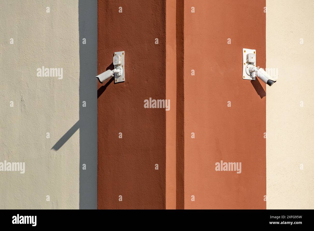 Camera hanging on the wall for video surveillance Stock Photo