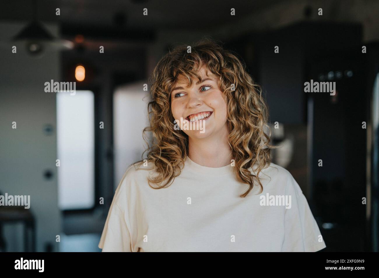 Beautiful woman smiling home hi-res stock photography and images - Alamy